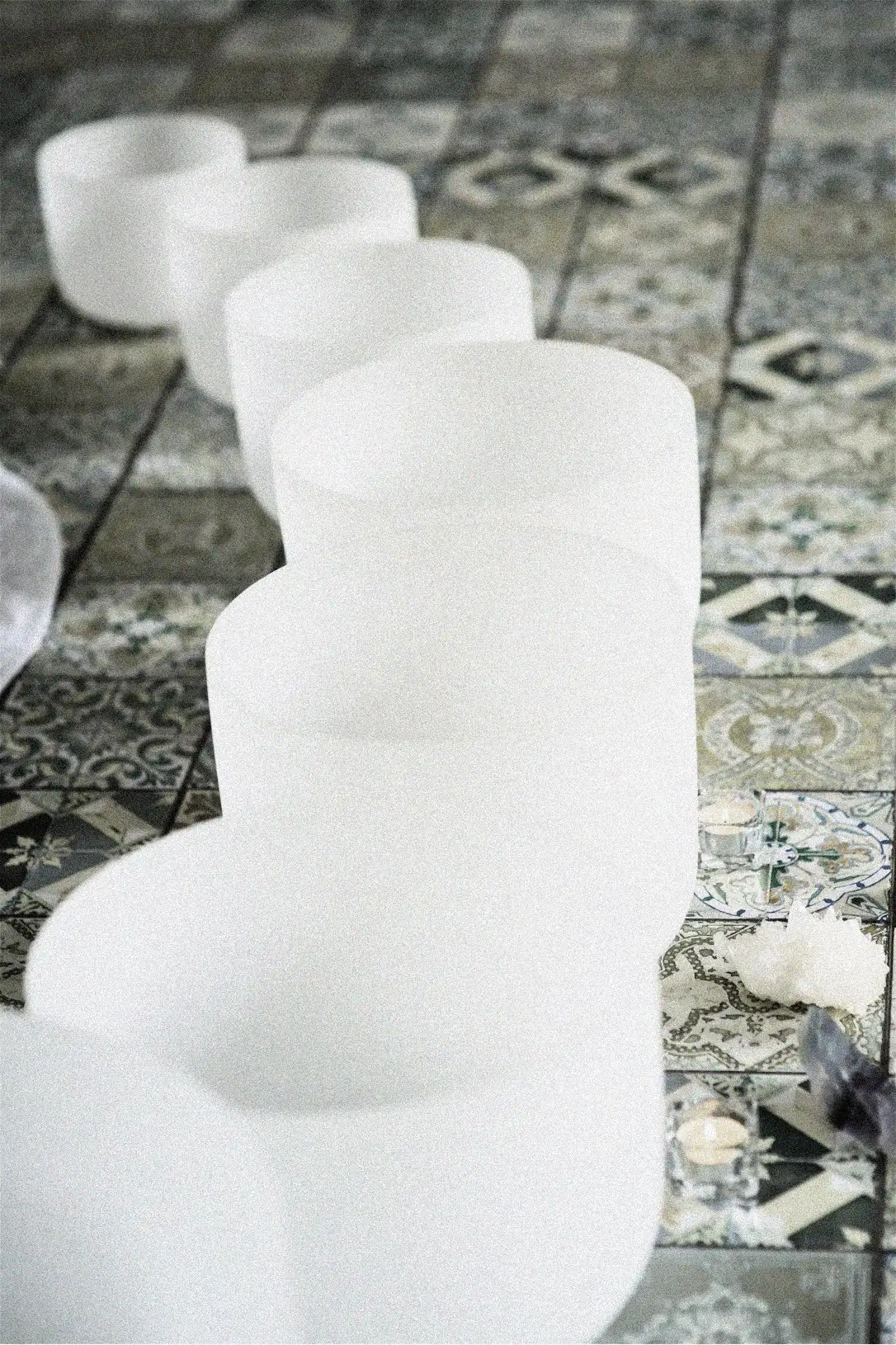 A row of crystal singing bowls