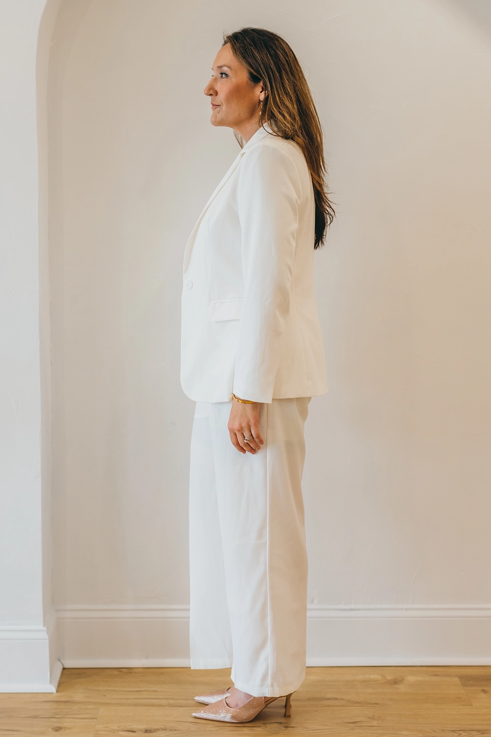 Kendra Beavis in a white suit